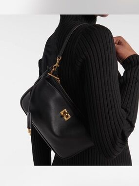 Balenciaga Rodeo Sling Pochette in black smooth calfskin, aged-gold hardware
